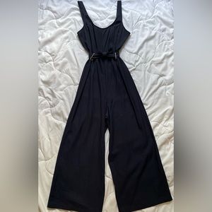 Navy blue jumpsuit with tie waist detailing 100% polyester